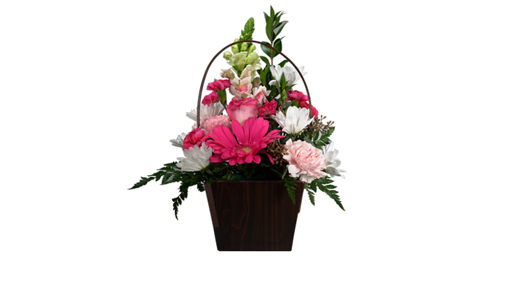 Fresh floral arrangement in basket